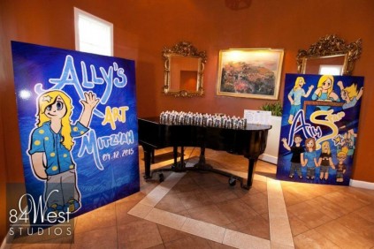 Aly's art mitzvah entrance and placecard table